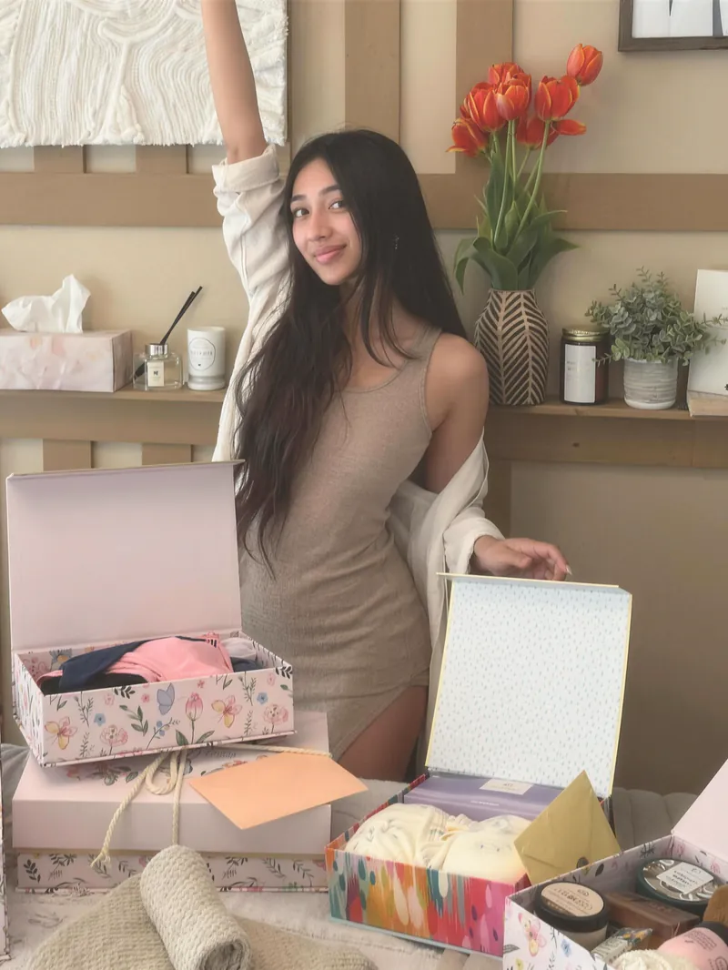 A new business owner celebrating in her finished studio