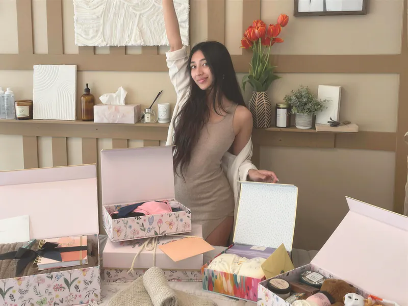 A new business owner celebrating in her finished studio