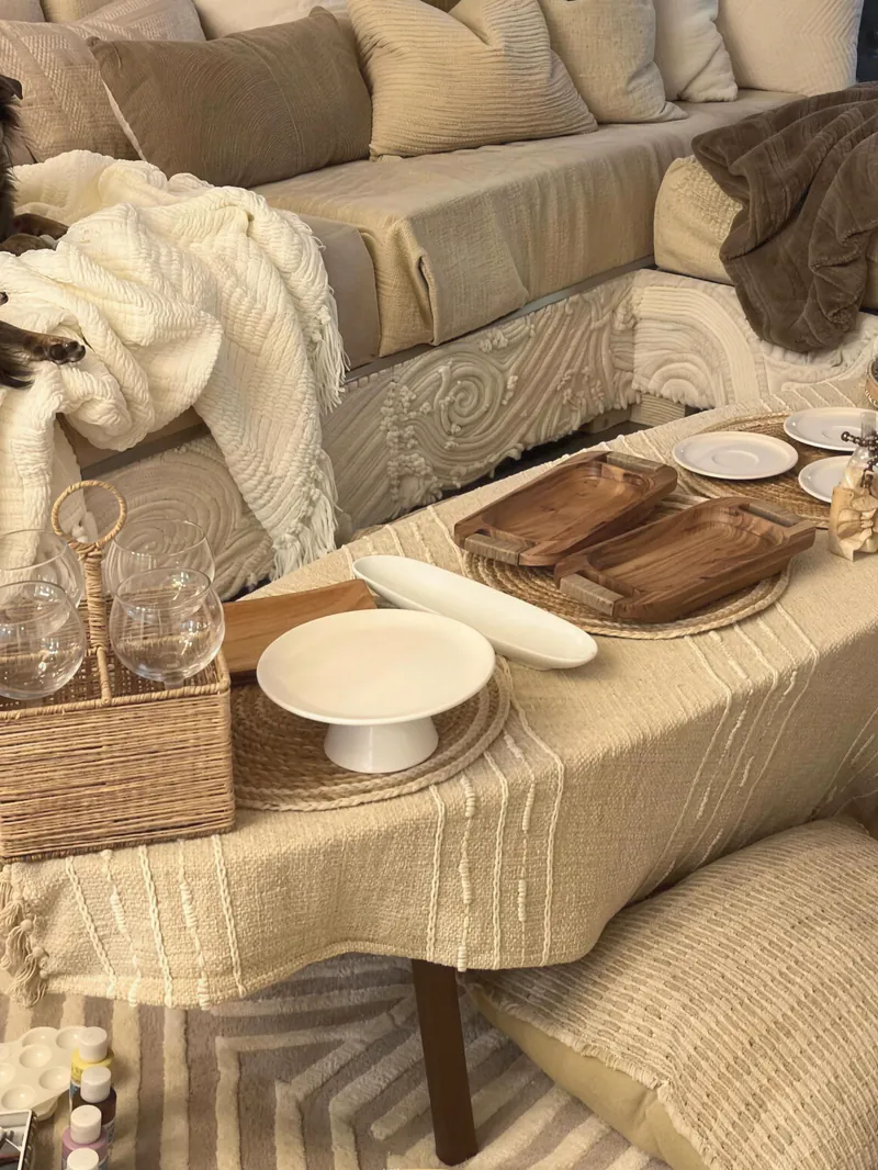 A cozy living room with linen sofas and soft cushions