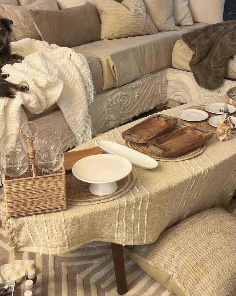 A cozy living room with linen sofas and soft cushions