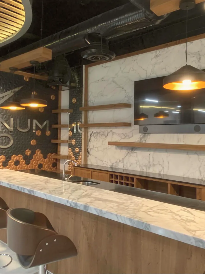 A raw commercial space renovated into a finished lounge
