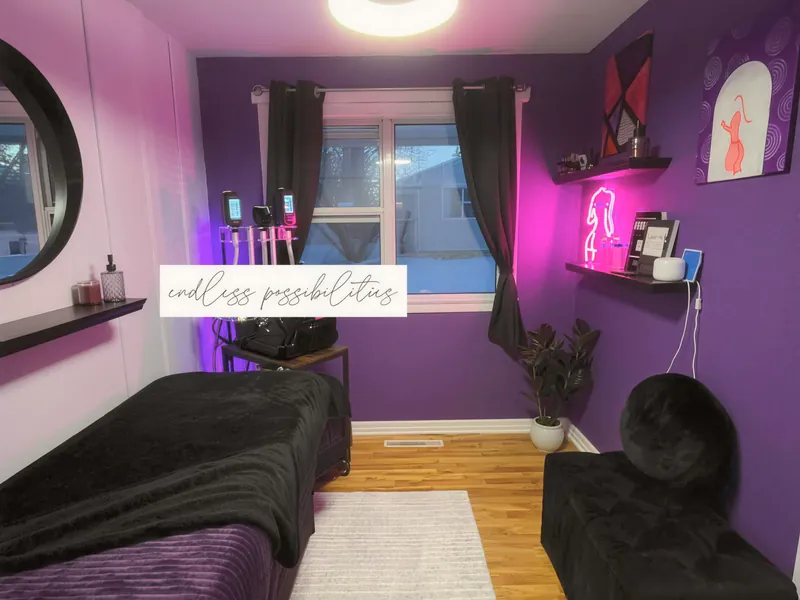 After: a treatment studio with purple accent lighting